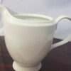 White Glossy Ceramic Pitcher